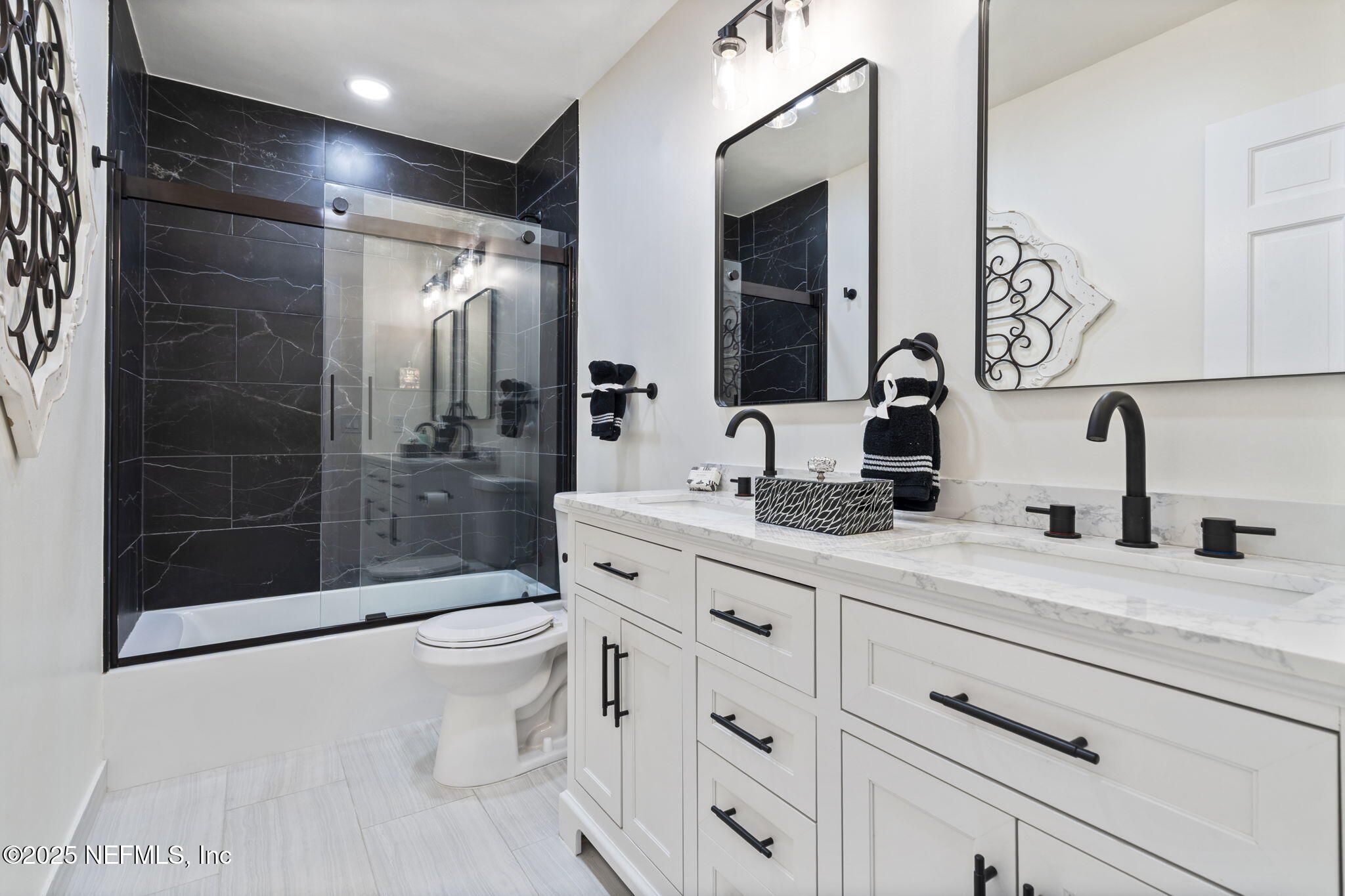 3715 Rustic Lane Jacksonville, FL 32217 - Photo 2 of 45 a bathroom with a double vanity sink toilet and shower
