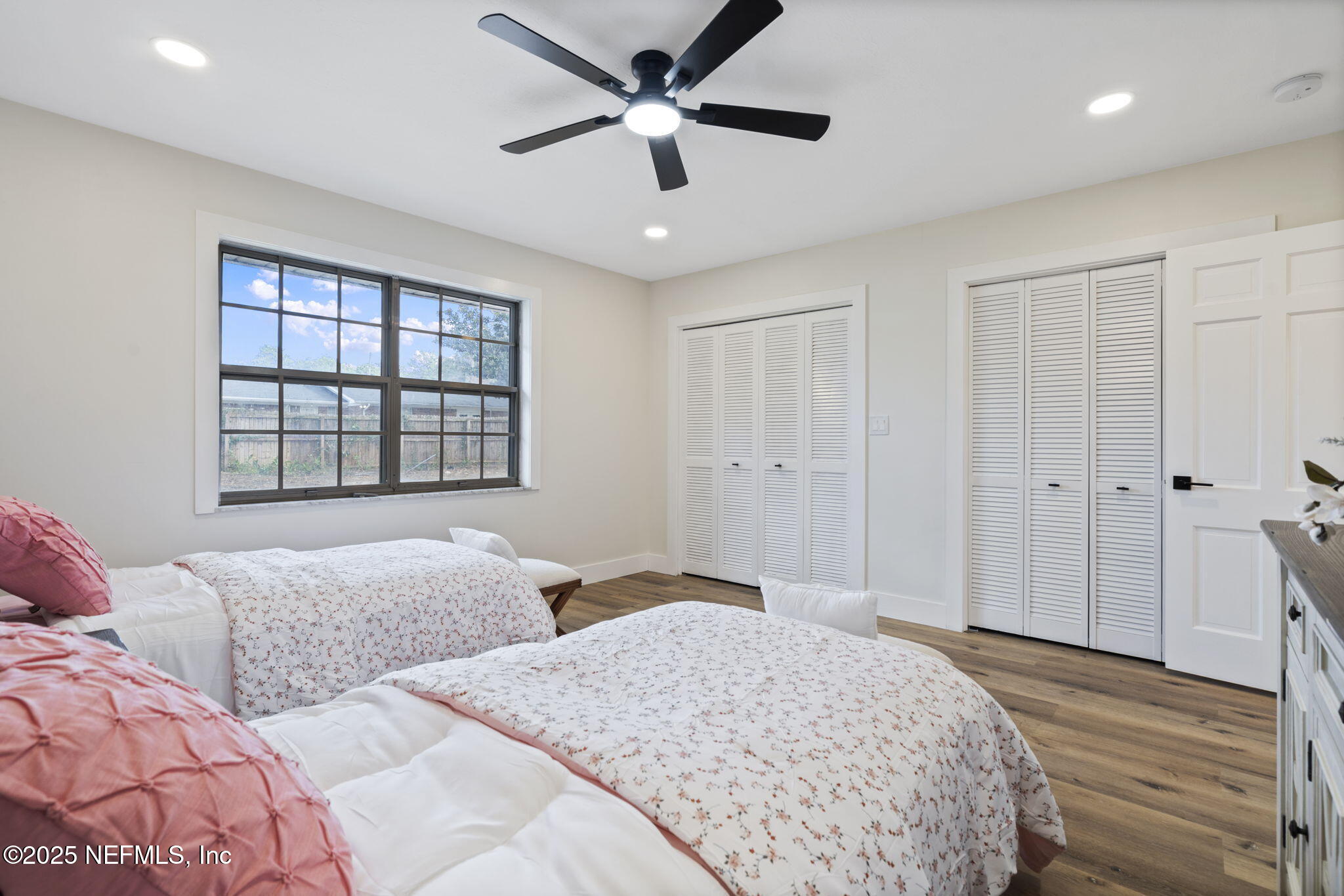 3715 Rustic Lane Jacksonville, FL 32217 - Photo 22 of 45 a bedroom with two beds and a window