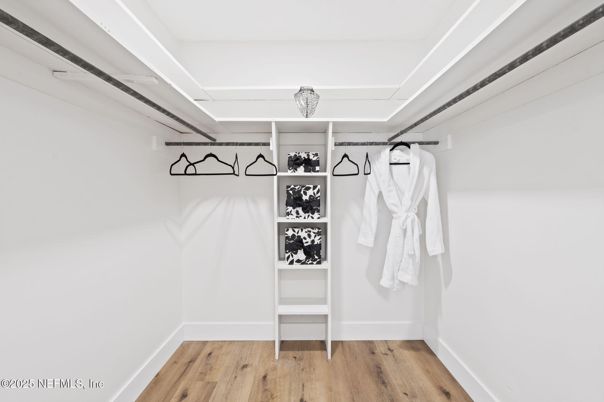 3715 Rustic Lane Jacksonville, FL 32217 - Photo 28 of 45 a view of walk in closet with wooden floor