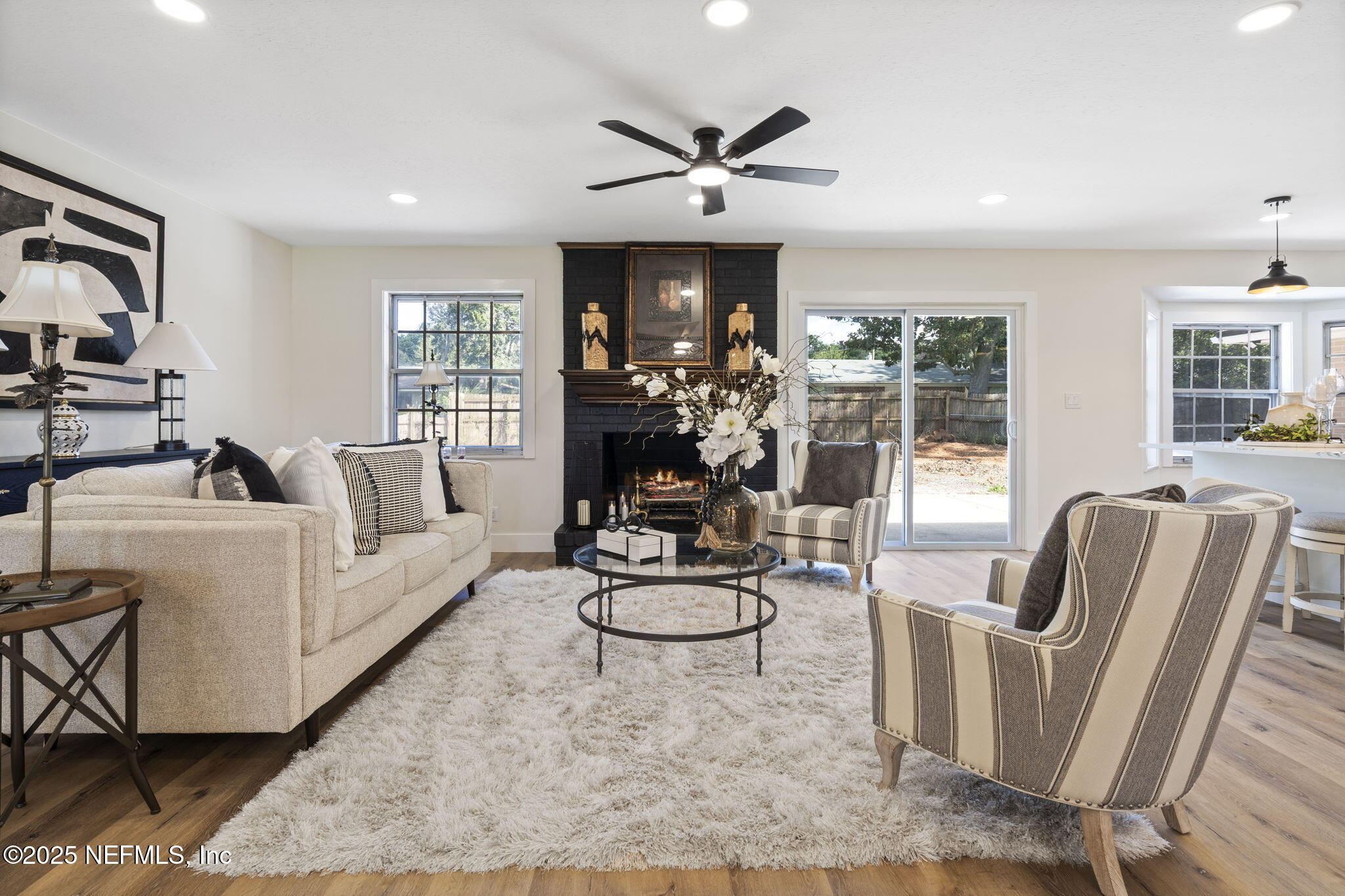 3715 Rustic Lane Jacksonville, FL 32217 - Photo 7 of 45 a living room with furniture and a large window