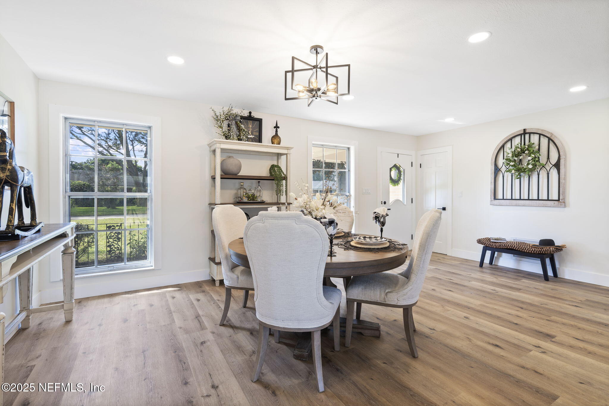 3715 Rustic Lane Jacksonville, FL 32217 - Photo 10 of 45 a view of a dining room with furniture window and wooden floor