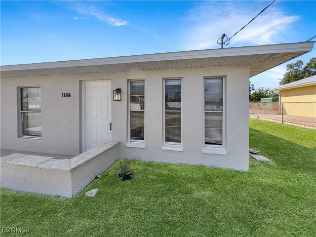 front view of house with a yard