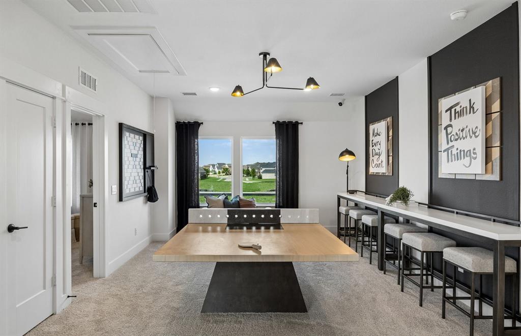 4728 Ripley Court Celina, TX 75009 - Photo 10 of 19 *Model Representation - Spacious game room on second level