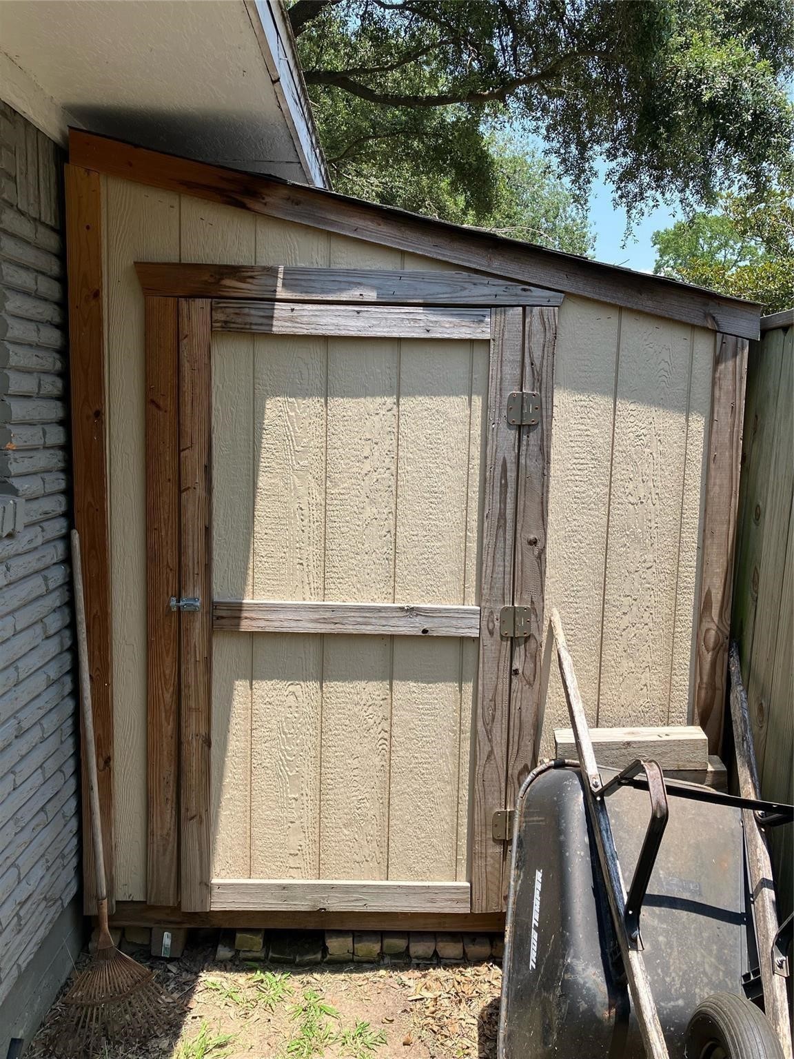 3027 Guese Road Houston, TX 77018 - Photo 20 of 22 Detached backyard storage shed gives tenants extra room for tools, seasonal décor, or outdoor equipment.
