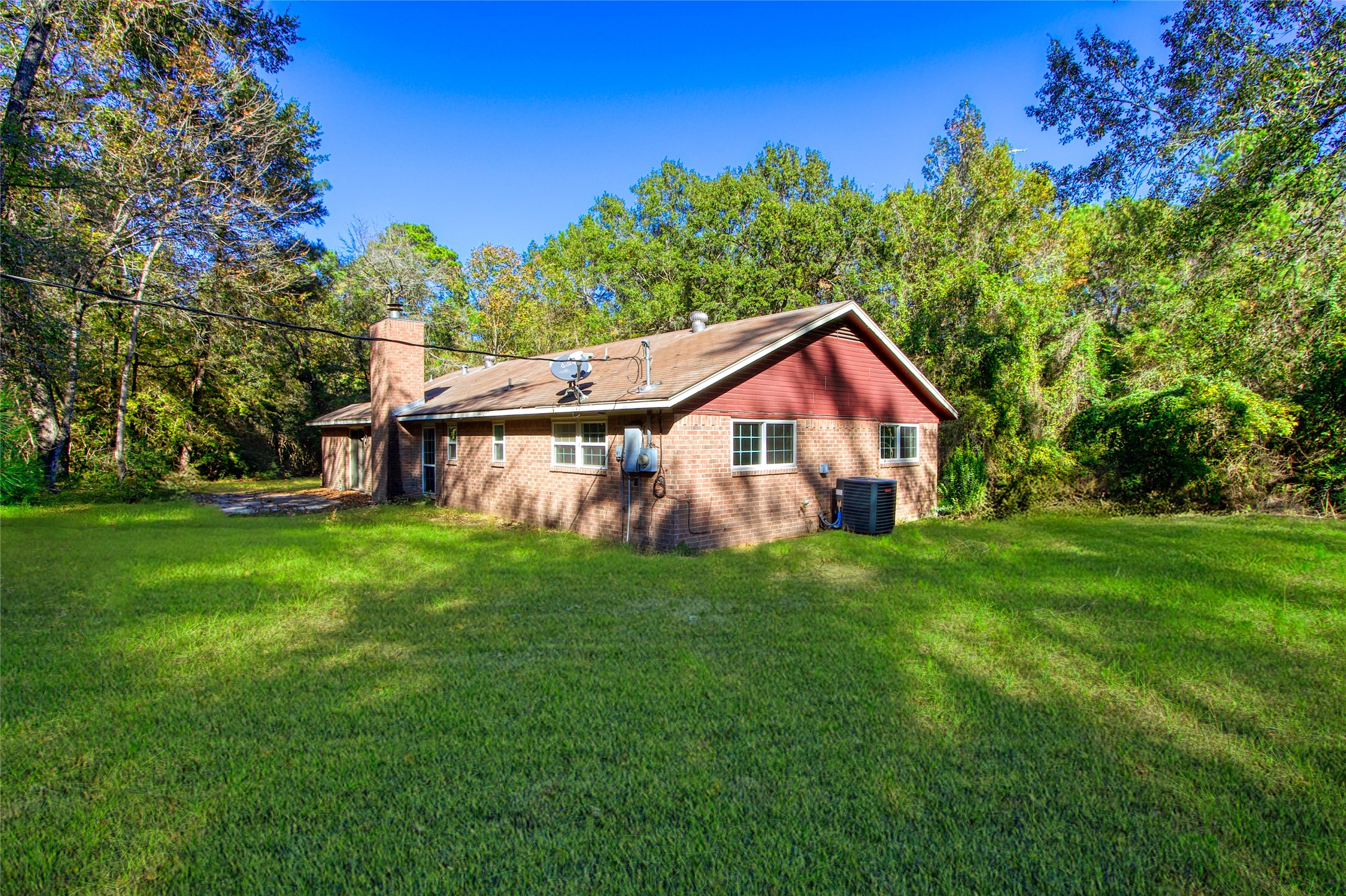 0 Gable Circle Magnolia, TX 77354 - Photo 8 of 10 a view of a house with a yard and deck