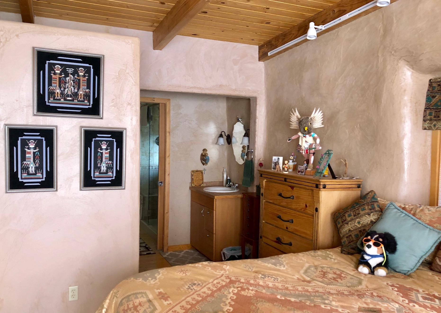 29050 30.90 Road Nucla, CO 81424 - Photo 11 of 25 a bedroom with a bed and a chandelier