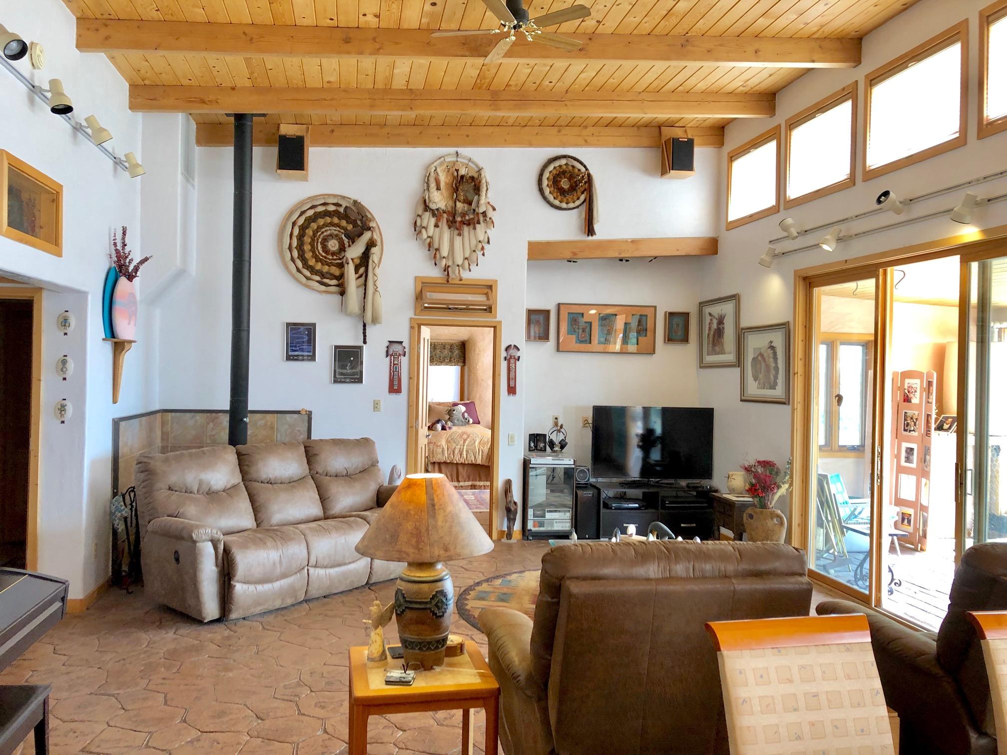 29050 30.90 Road Nucla, CO 81424 - Photo 12 of 25 a living room with furniture and a flat screen tv