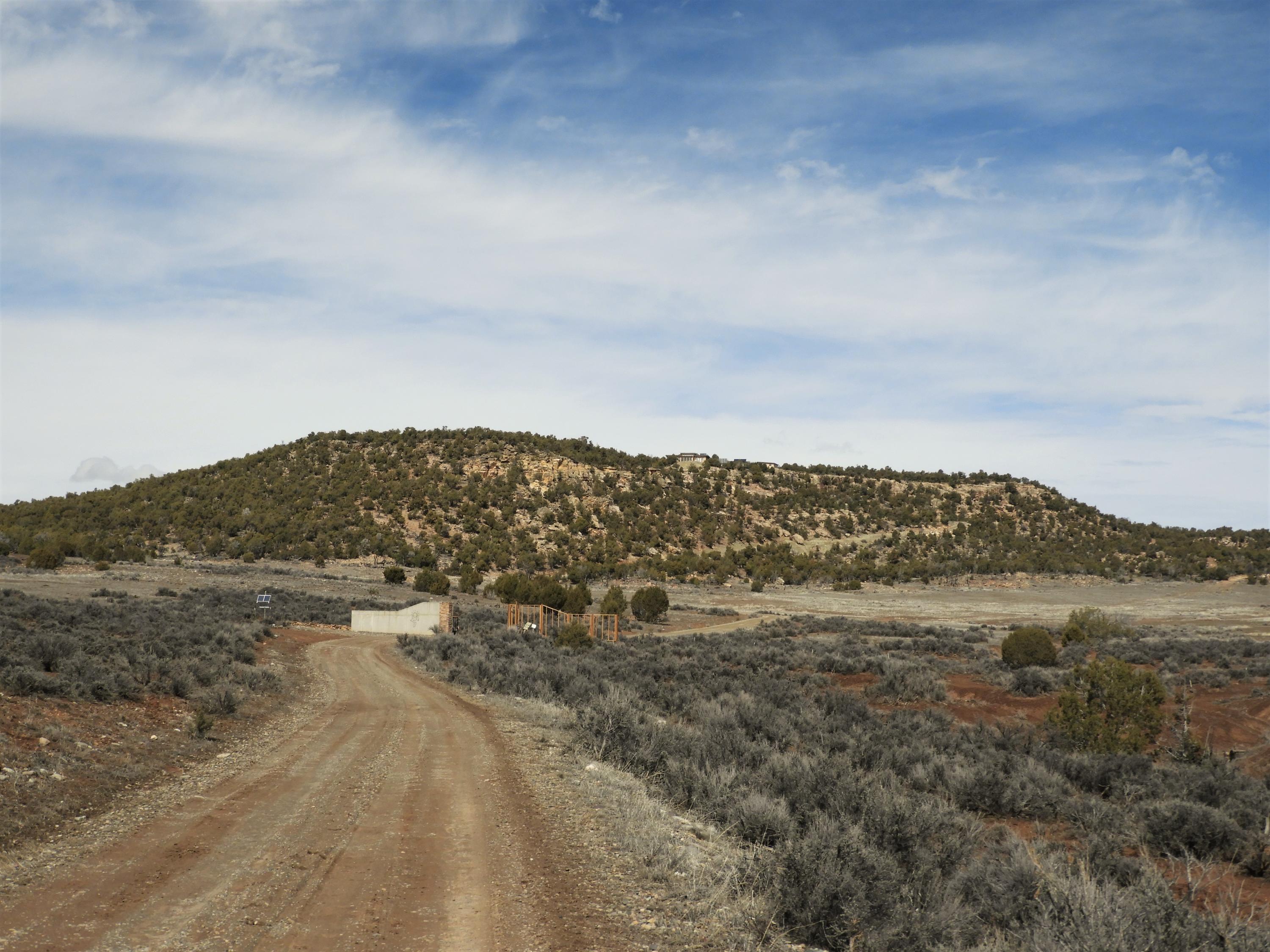 29050 30.90 Road Nucla, CO 81424 - Photo 14 of 25 a view of a large building with mountains in the background