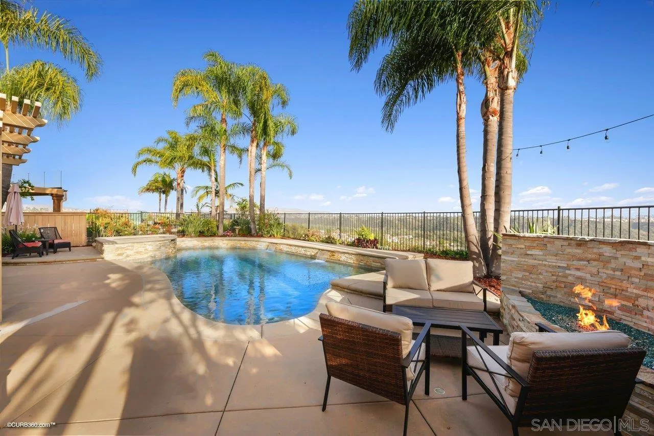 12504 Eclipse Place San Diego, CA 92129 - Photo 15 of 60 a view of swimming pool with outdoor seating