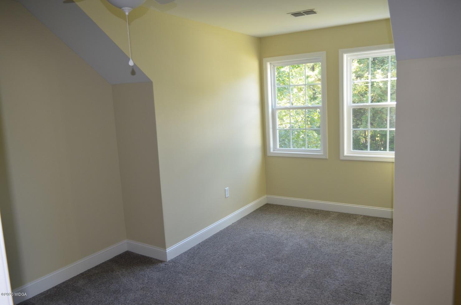 253 Chadwick Circle Macon, GA 31210 - Photo 16 of 19 an empty room with windows