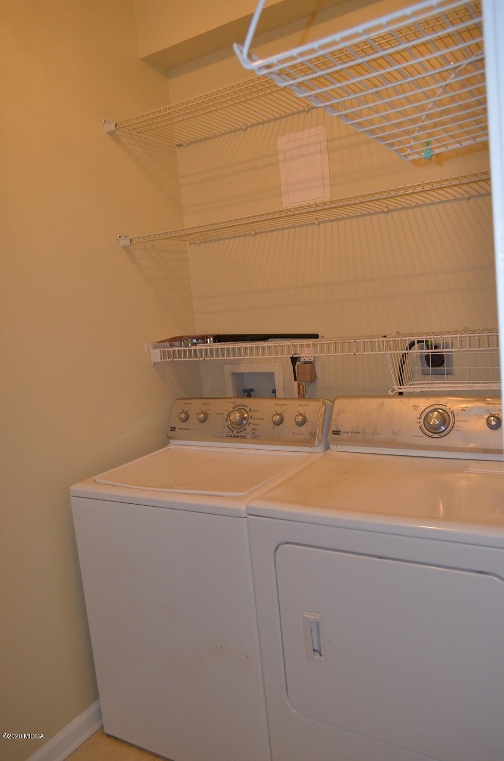 253 Chadwick Circle Macon, GA 31210 - Photo 10 of 19 a utility room with dryer and washer