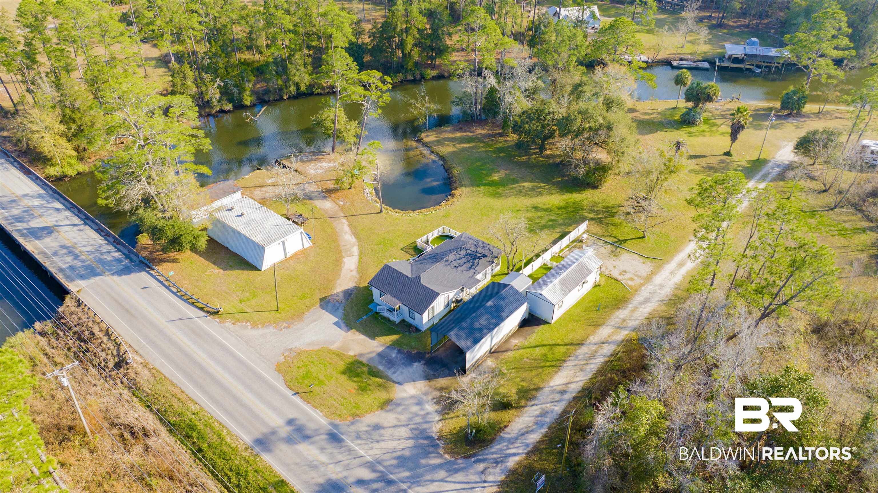 23770 Miflin Road Elberta, AL 36530 - Photo 37 of 38 Bird's eye view of a large body of water and a tree filled landscape