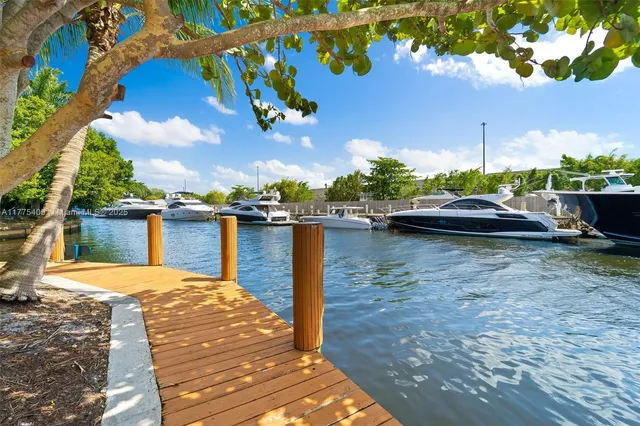 a front view of a house with a lake view