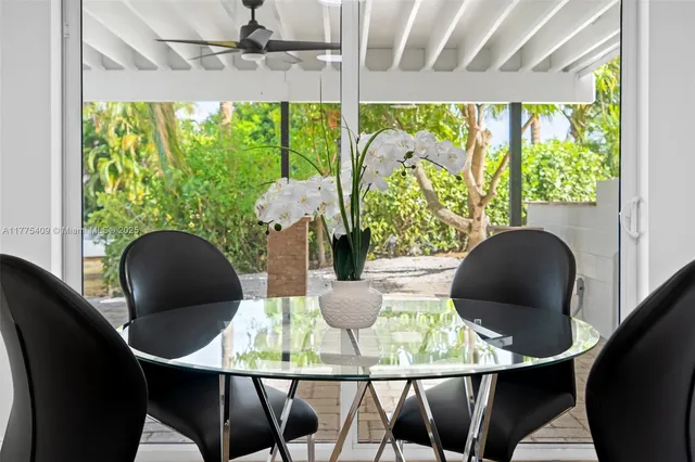 a table and chairs in a balcony