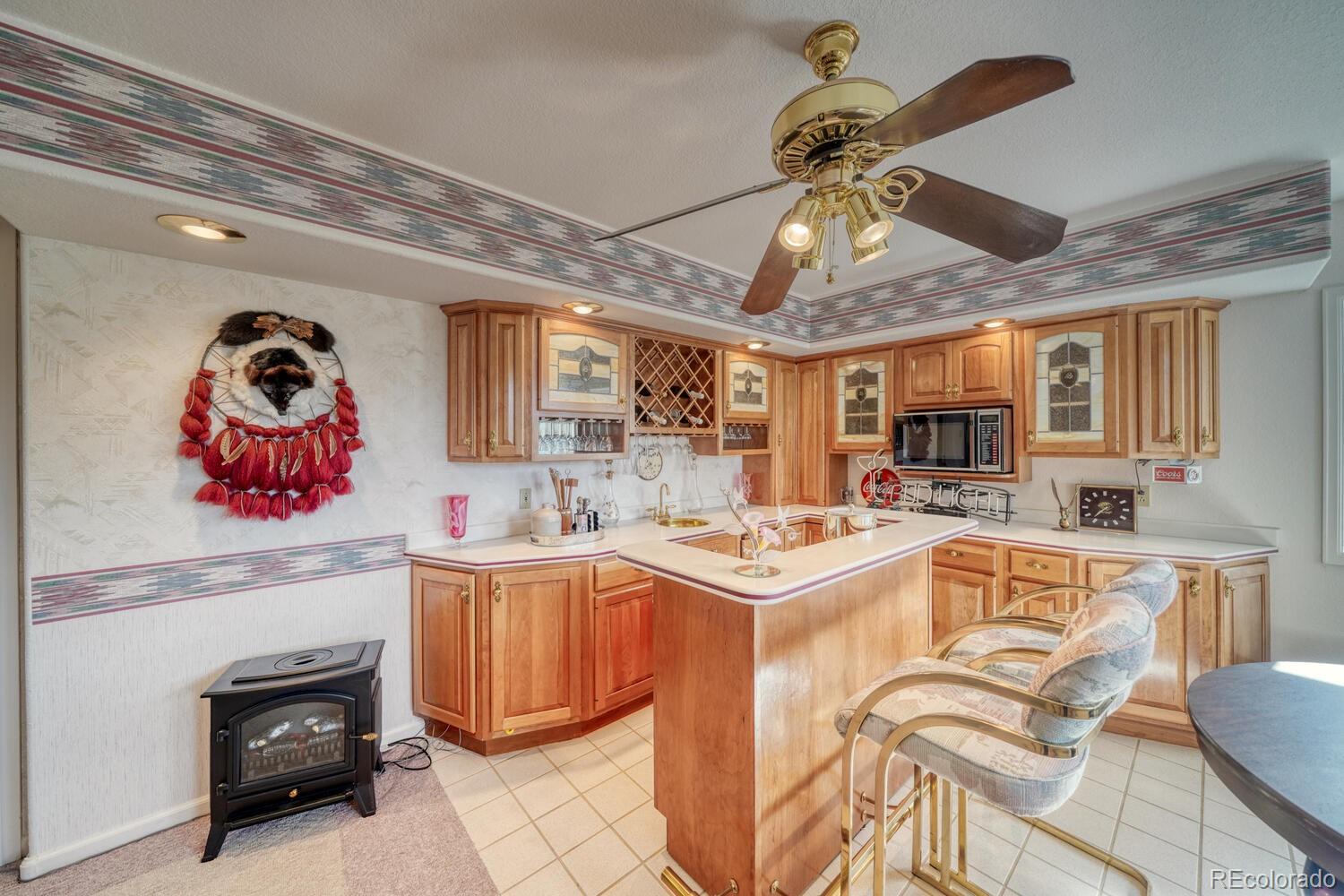 165 Reva Ridge Road Twin Lakes, CO 81251 - Photo 11 of 48 a kitchen with a sink a stove and cabinets