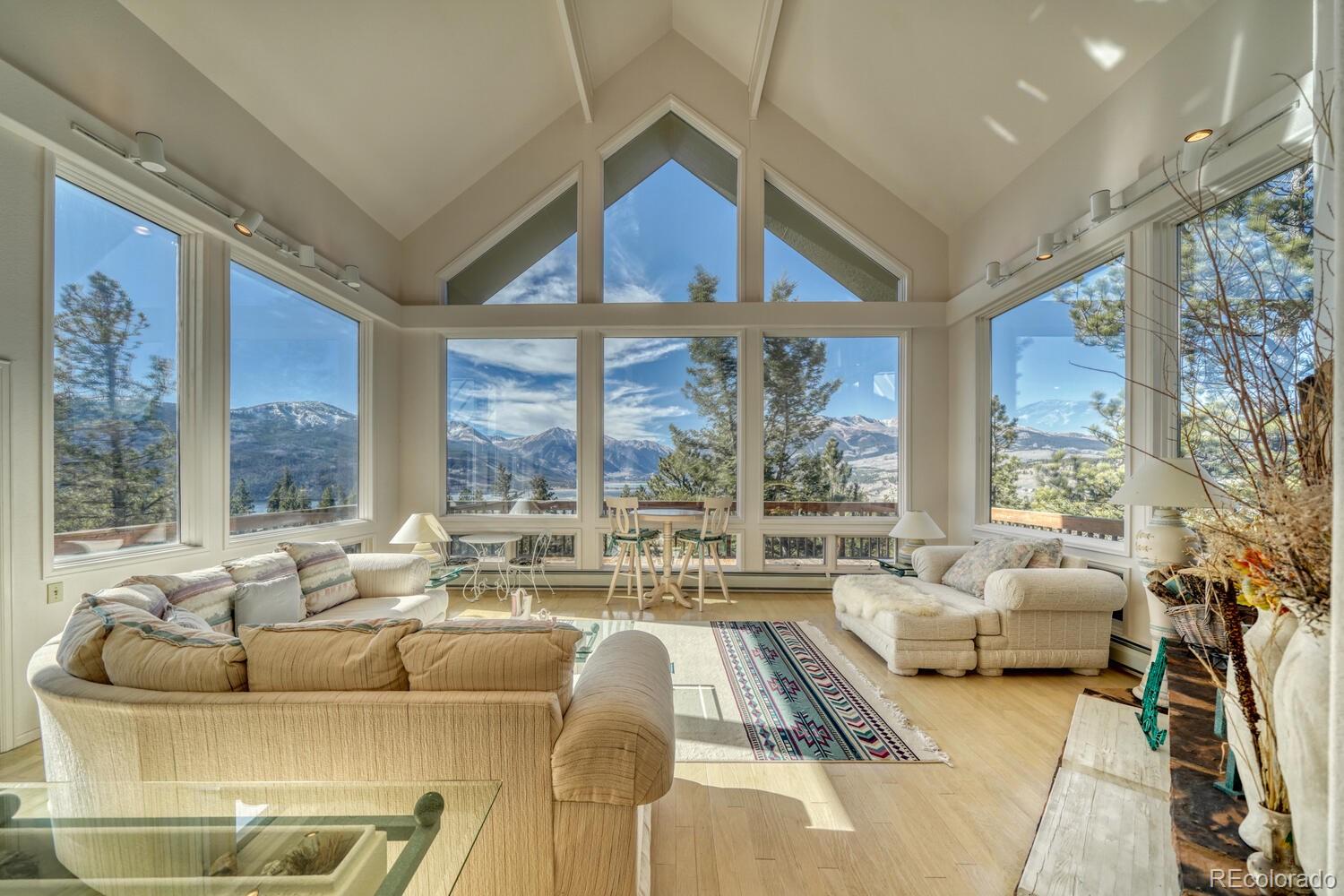 165 Reva Ridge Road Twin Lakes, CO 81251 - Photo 19 of 48 a living room with furniture and large windows