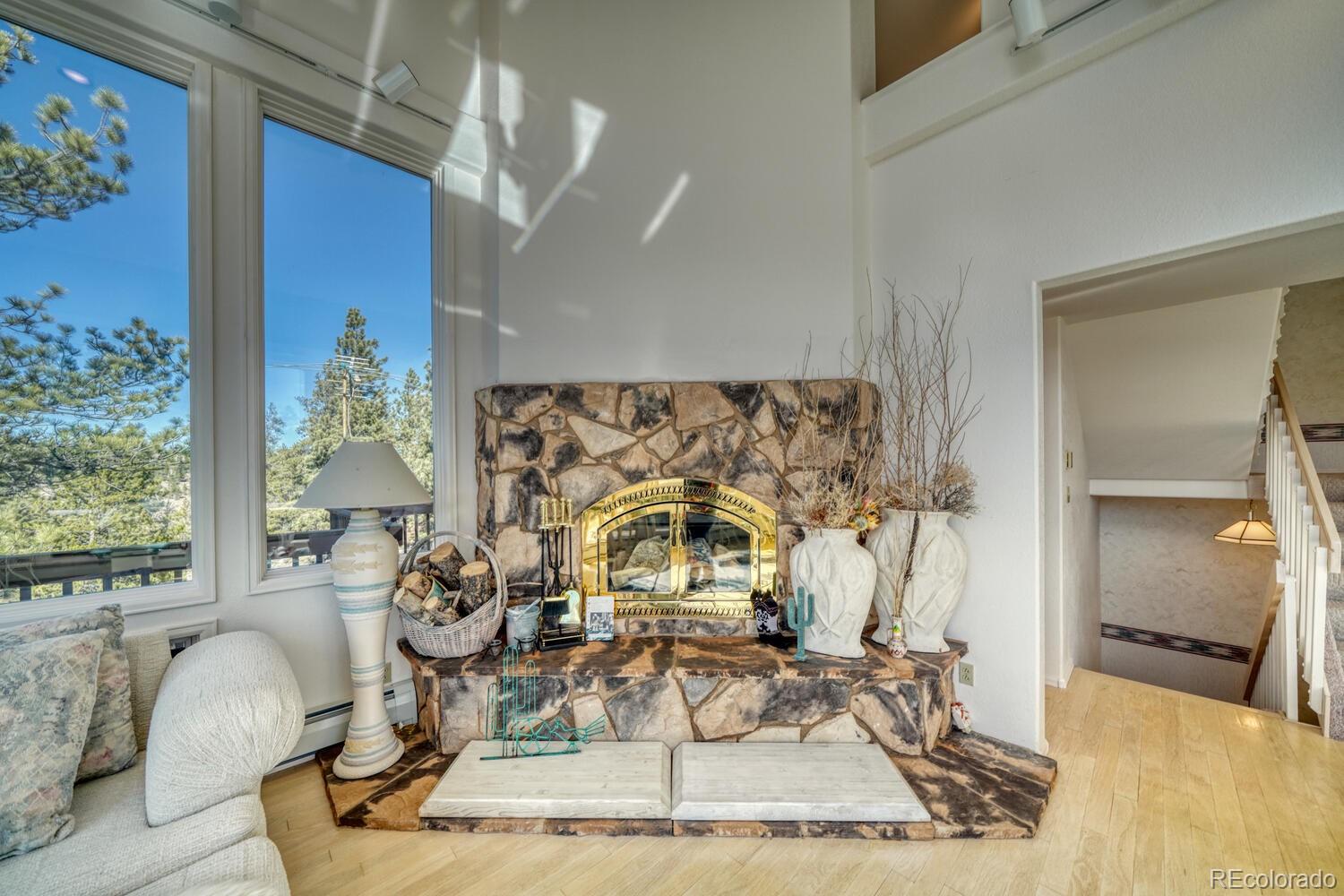 165 Reva Ridge Road Twin Lakes, CO 81251 - Photo 25 of 48 a view of living room with furniture and a chandelier