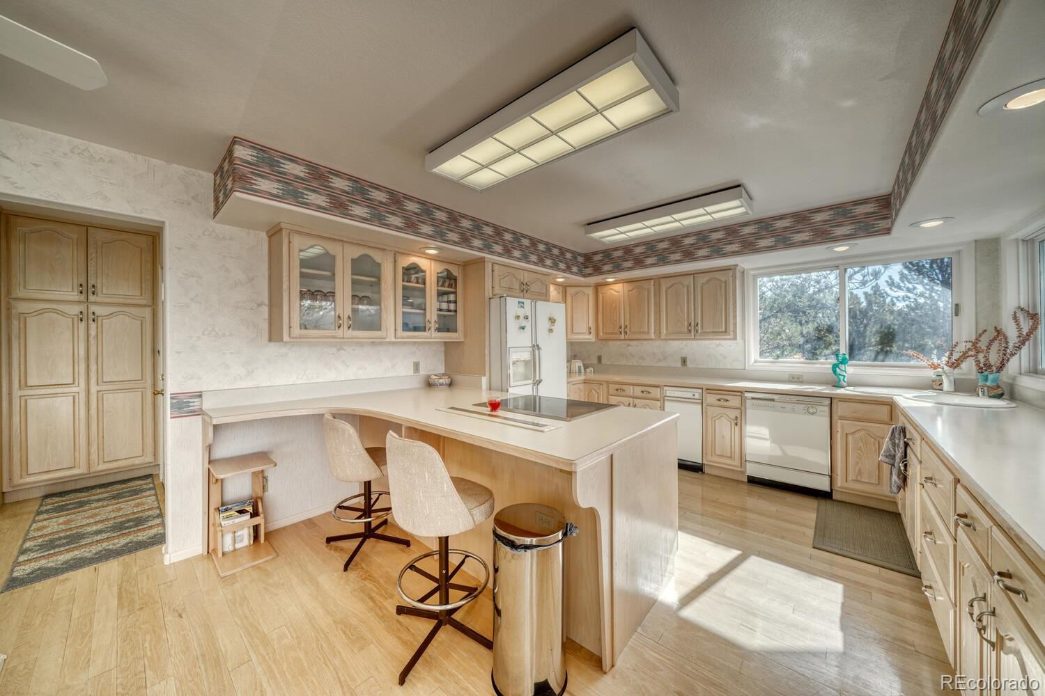 165 Reva Ridge Road Twin Lakes, CO 81251 - Photo 30 of 48 a kitchen with a sink cabinets and window