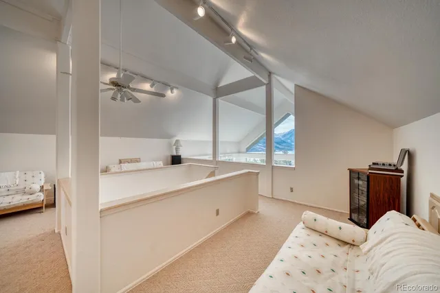 a view of a house with a tree