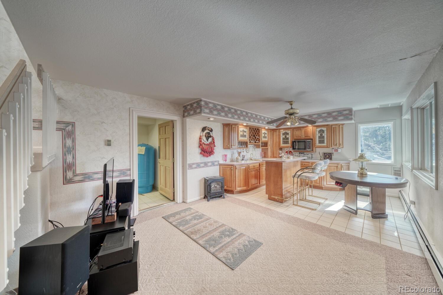 165 Reva Ridge Road Twin Lakes, CO 81251 - Photo 10 of 48 a bed room with a bed and a large mirror