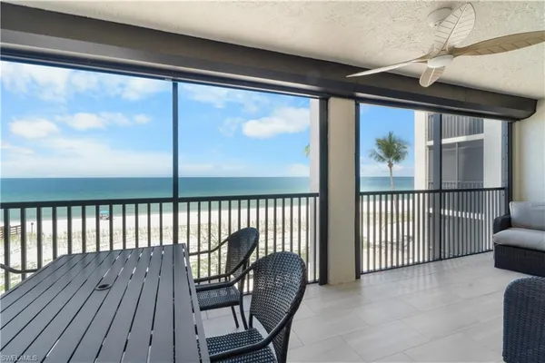 a view of a porch with wooden floor