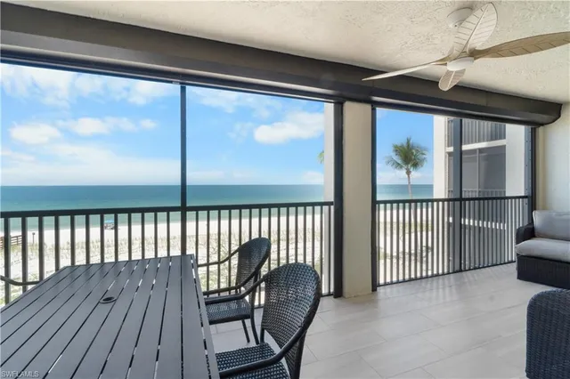 a view of a porch with wooden floor