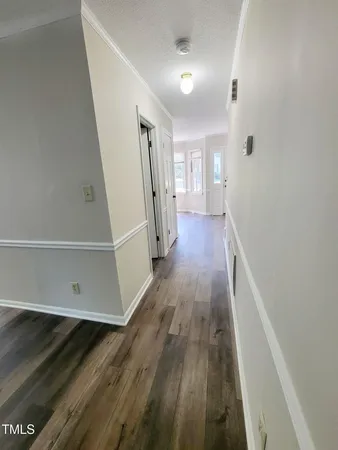 a view of entryway with wooden floor
