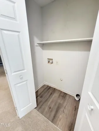 a bathroom with sink a mirror and a shower