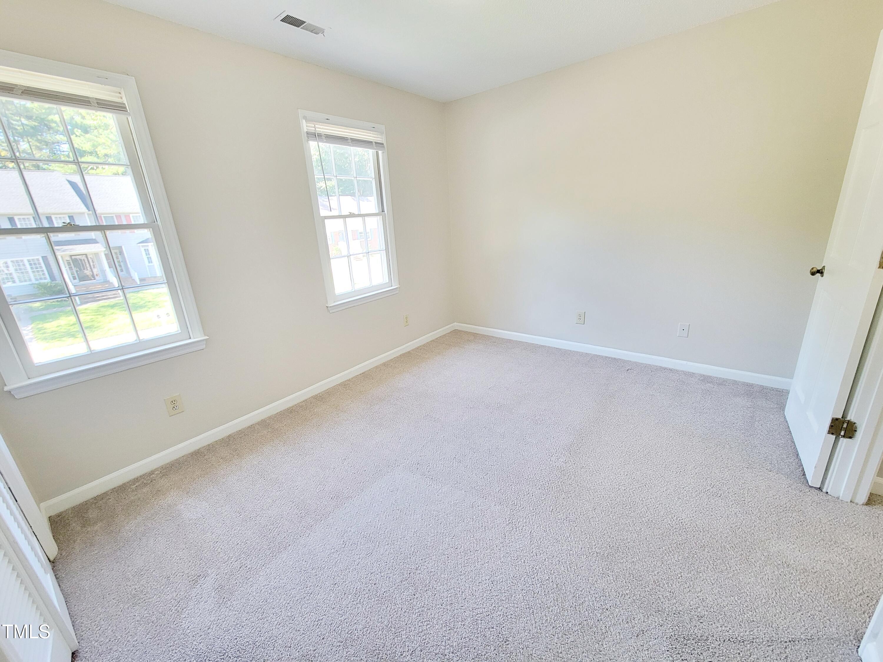 500 Brent Road, Unit 101 Raleigh, NC 27606 - Photo 42 of 62 an empty room with a window