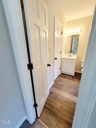 a view of wooden floor in an empty room