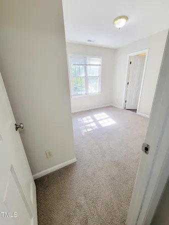 a view of a wooden deck with a trees