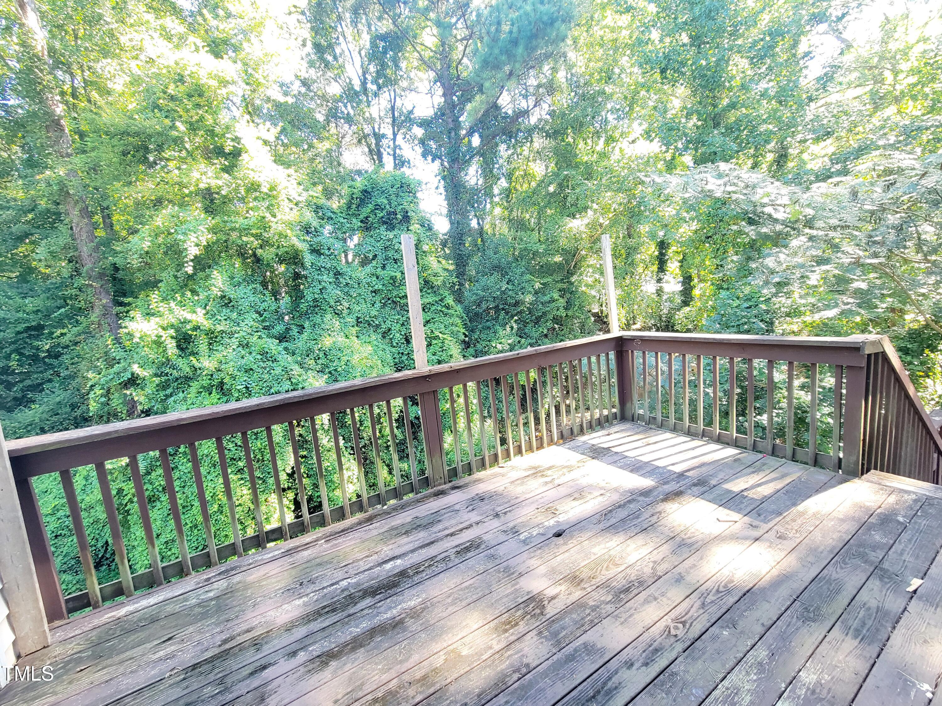 500 Brent Road, Unit 101 Raleigh, NC 27606 - Photo 56 of 62 a view of backyard with deck and outdoor space