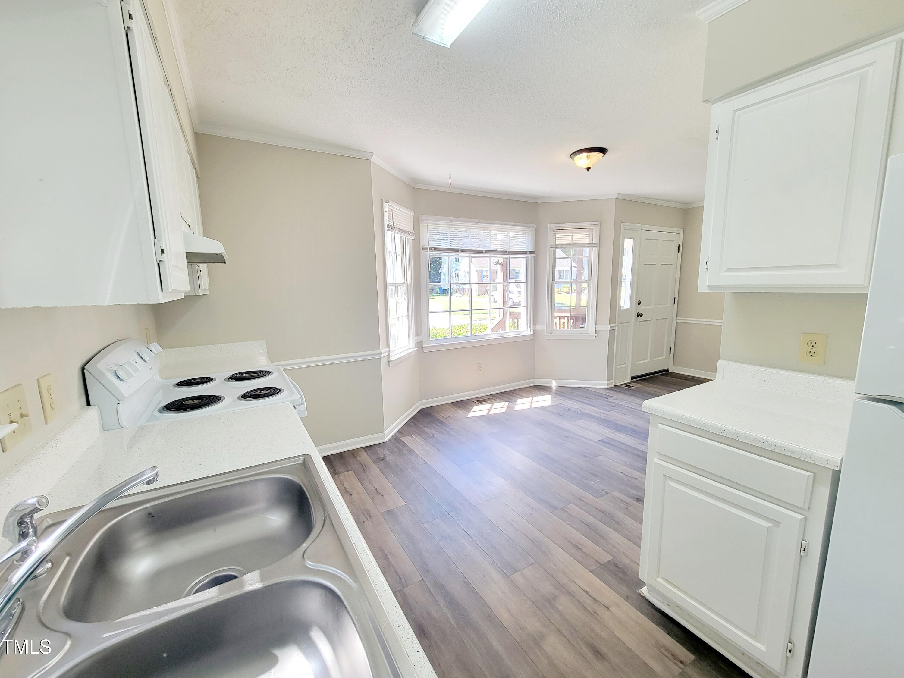 500 Brent Road, Unit 101 Raleigh, NC 27606 - Photo 9 of 62 a room with storage and utility