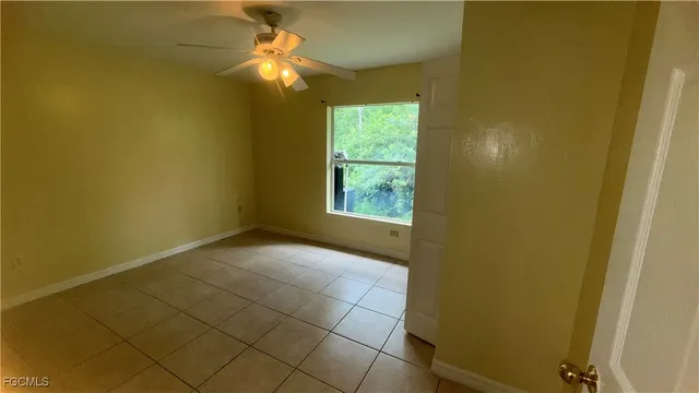 a view of an empty room and window