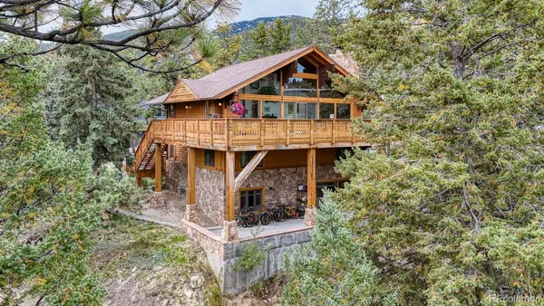 an aerial view of a house with a balcony
