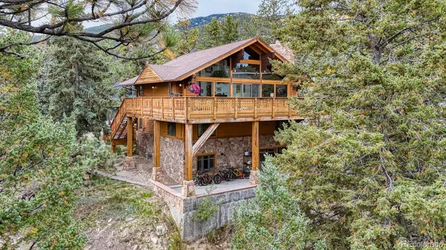 an aerial view of a house with a balcony