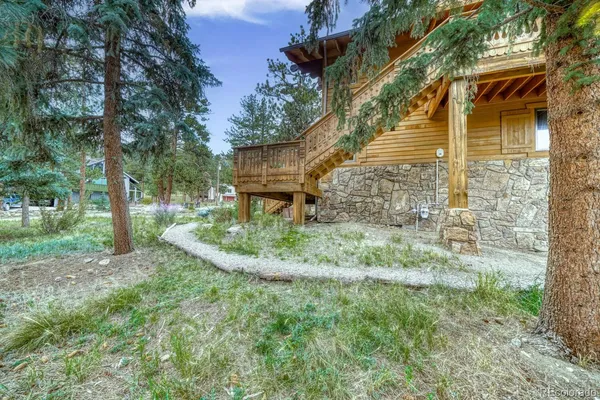 a view of a garden with a bench
