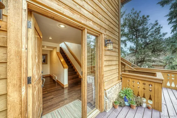 a view of balcony with furniture