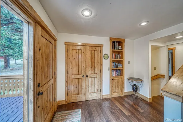 a view of livingroom with hardwood floor and a ceiling fan