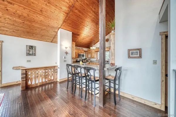 a view of a chairs and table in the patio