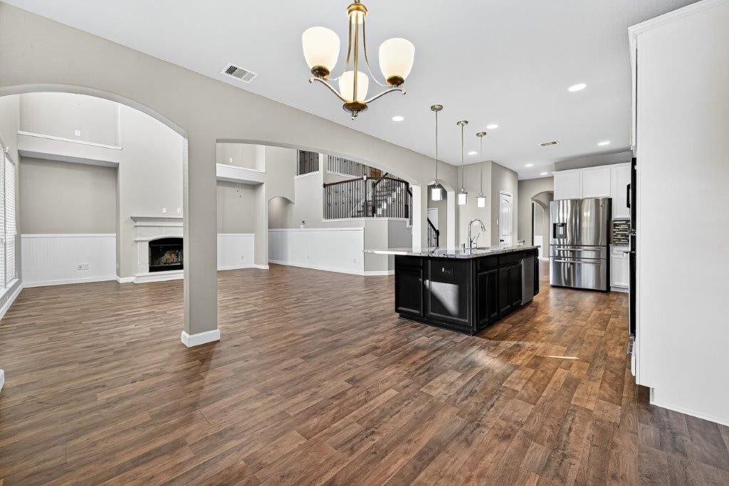 5710 Metaphor Way Richmond, TX 77469 - Photo 13 of 41 The breakfast area sits beside the kitchen, overlooking the living space while offering casual dining with views to the outdoors.