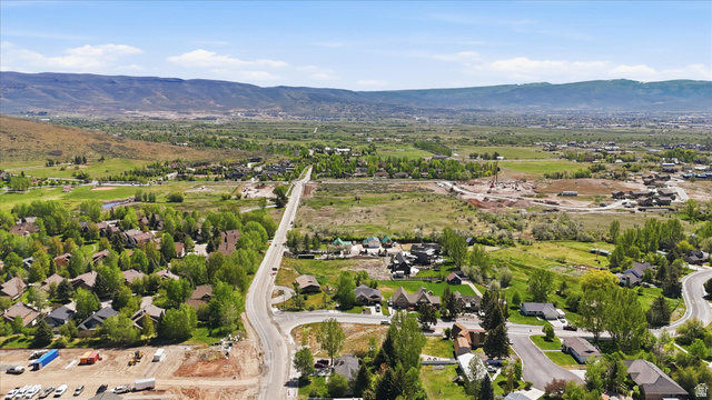 123 West 1050th North, Unit 41 Midway, UT 84049 - Photo 19 of 22 Expansive mountain valley landscape featuring residential developments and undeveloped land