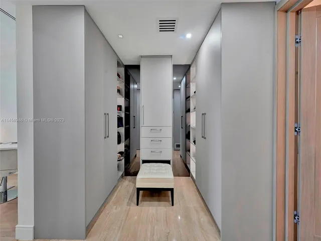 a view of a bathroom from a hallway