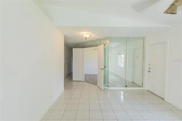 an empty room with a bathroom