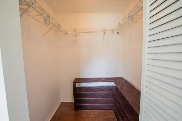 a view of small space with racks on the wall