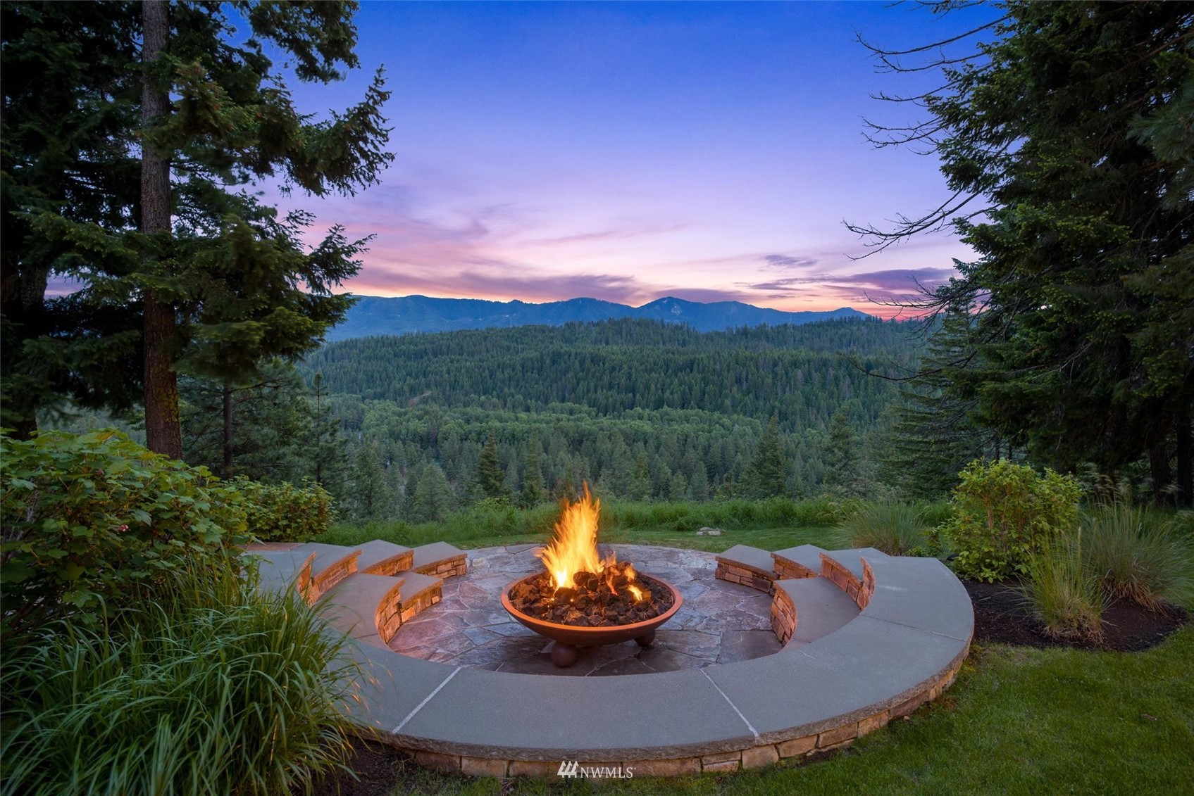 a view of a swimming pool with a yard