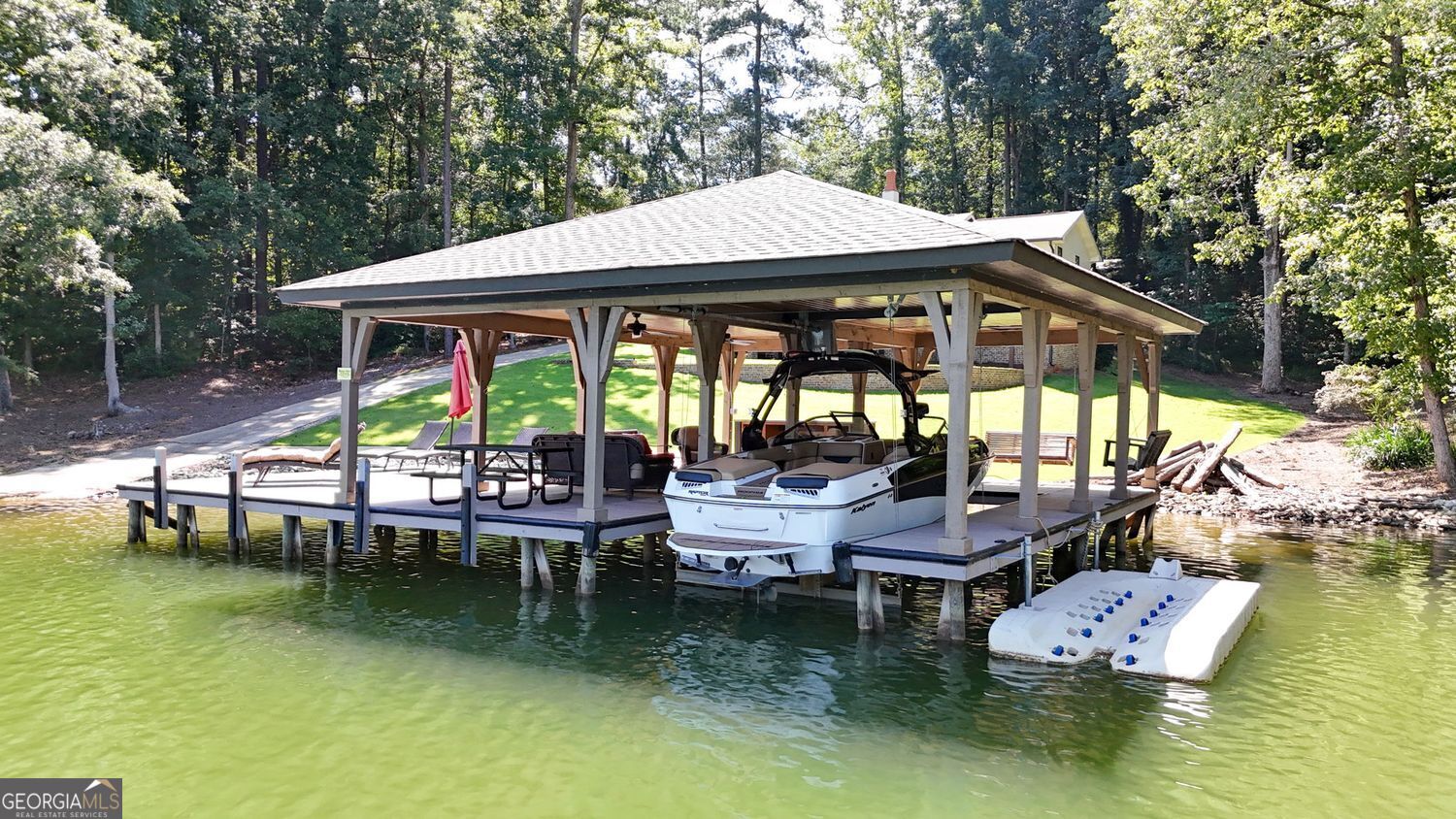 170 B Tater Hill Road Jackson, GA 30233 - Photo 11 of 74 a view of house with swimming pool and porch with furniture