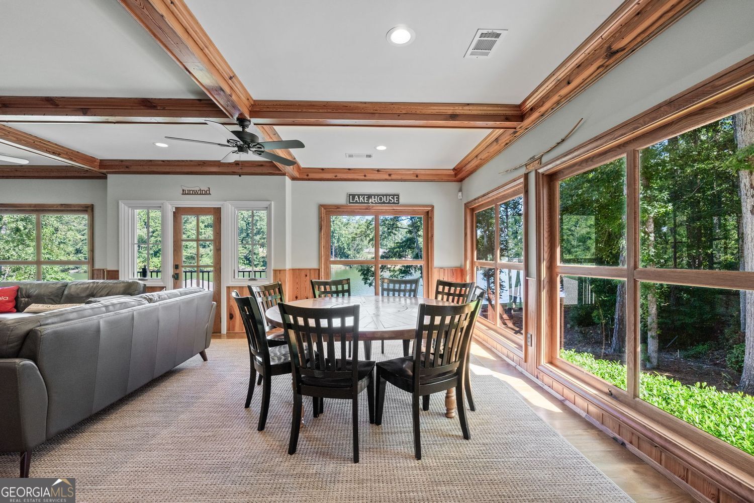 170 B Tater Hill Road Jackson, GA 30233 - Photo 20 of 74 a view of a dining room with furniture large windows and wooden floor