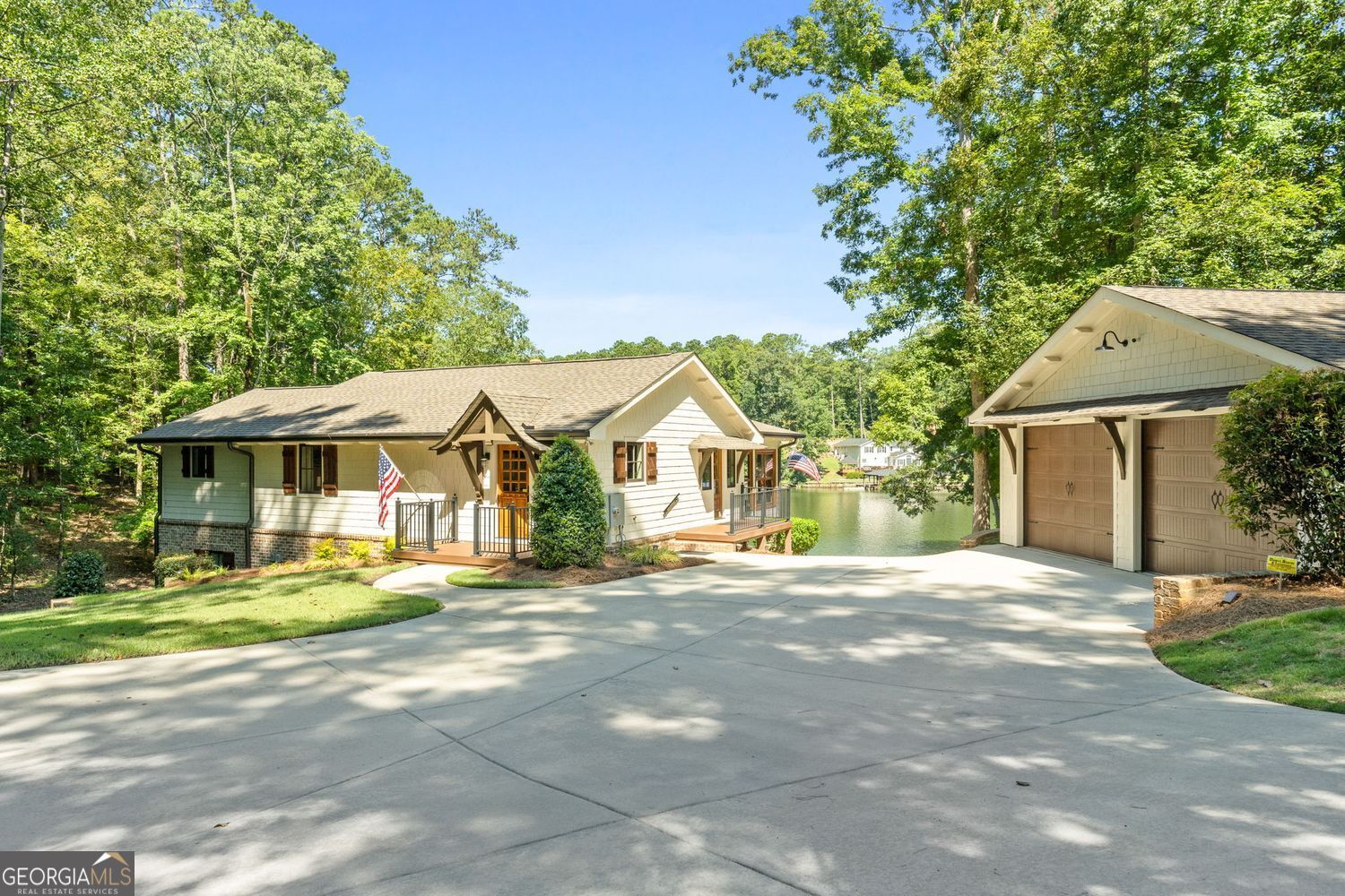 170 B Tater Hill Road Jackson, GA 30233 - Photo 2 of 74 a front view of a house with a garden