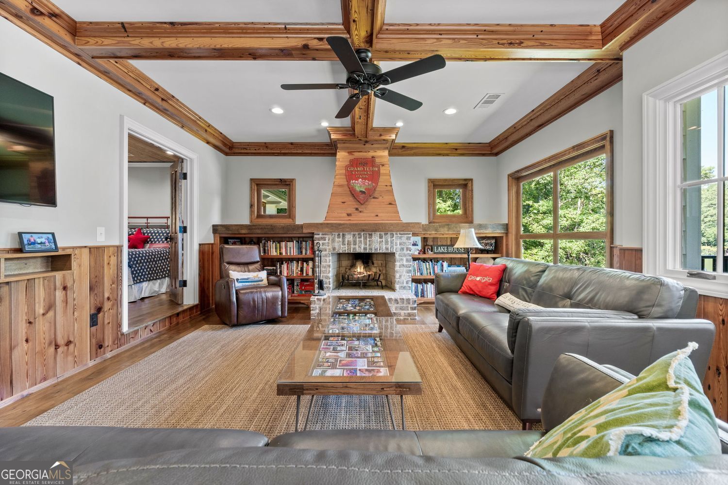 170 B Tater Hill Road Jackson, GA 30233 - Photo 23 of 74 a living room with furniture fireplace and a large window